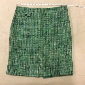 - Cute green skirt.